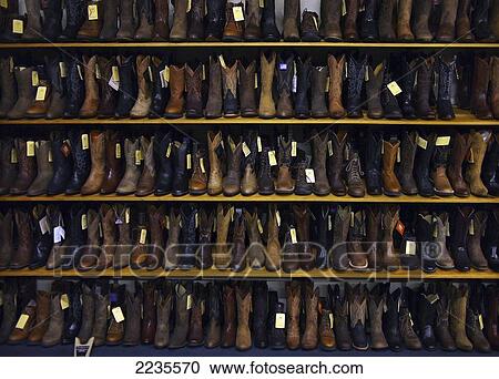 Stock Image - Shelves of cowboy boots; Las Vegas, Nevada, United States of America. Fotosearch