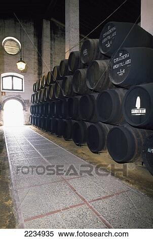 Stock Photography - Sherry Cellar At Sandeman Bodega, Jerez, Andalucia, Spain.. Fotosearch