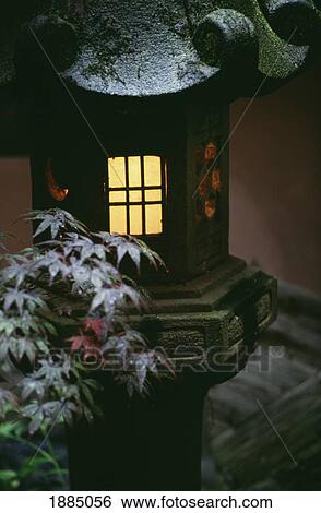 Stock Photograph - Shimake House And Leaves At Night. Fotosearch