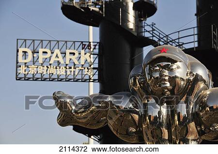 Shiny Metal Sculpture And Black Metal Stairway With A Parking Sign Against A Blue Sky; Beijing China View Large Photo Image Stock Image - Shiny Metal Sculpture And Black Metal Stairway With A Parking Sign Against A Blue Sky; Beijing China. Fotosearch