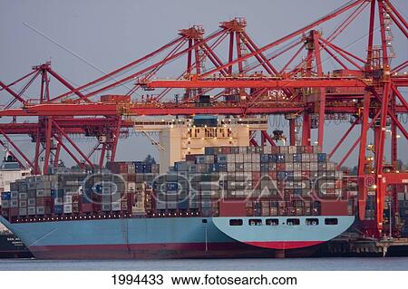 Stock Image - Ship At The Container Terminal Of The Port Of Vancouver, British Columbia, Canada. Fotosearch