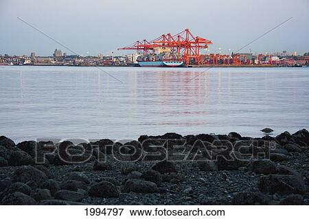 Stock Photo - Ship At The Container Terminal Of The Port Of Vancouver, British Columbia, Canada. Fotosearch