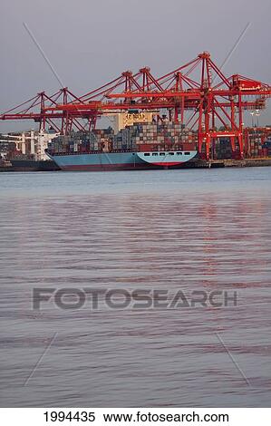 Ship At The Container Terminal Of The Port Of Vancouver, British Columbia, Canada View Large Photo Image Stock Photography - Ship At The Container Terminal Of The Port Of Vancouver, British Columbia, Canada. Fotosearch
