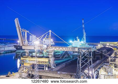 Ship in port at dusk; Genoa, Liguria, Italy View Large Photo Image Stock Image - Ship in port at dusk; Genoa, Liguria, Italy. Fotosearch