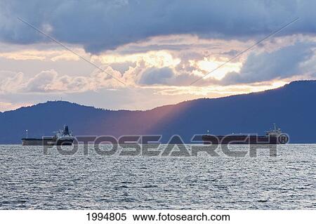 Stock Photography - Ships In English Bay At Dusk, Vancouver, British Columbia, Canada. Fotosearch