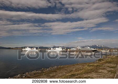 Ships In The Harbour; Ushuaia, Tierra Del Fuego, Argentina View Large Photo Image Stock Photo - Ships In The Harbour; Ushuaia, Tierra Del Fuego, Argentina. Fotosearch