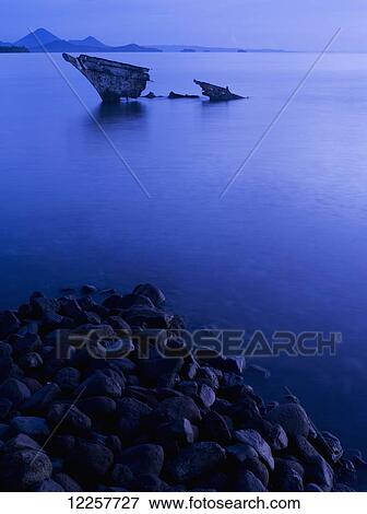 Stock Photo - Shipwreck off the West coast of Kimbe; West New Britain, Papua New Guinea. Fotosearch