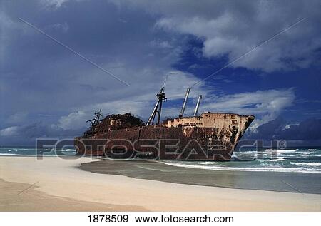 Stock Photo - Shipwreck On A White Sand Beach. Fotosearch
