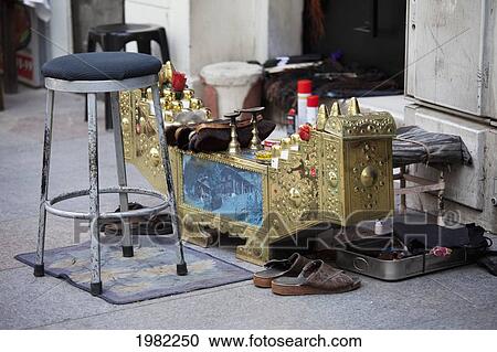Stock Image - Shoe Shine Service In Taksim Square; Istanbul Turkey. Fotosearch