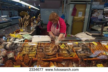 Stock Photo - Shop Assistant In Fish Store; Riga, Latvia. Fotosearch
