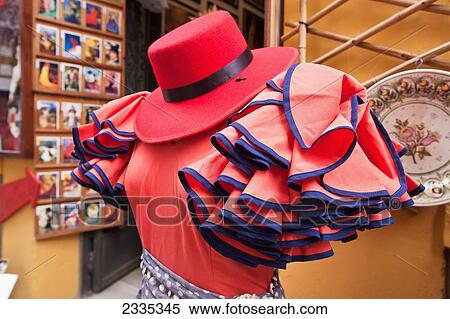 Stock Photography - Shop Displaying Traditional Dress During April Feria Festival; Seville, Andalucia, Spain. Fotosearch