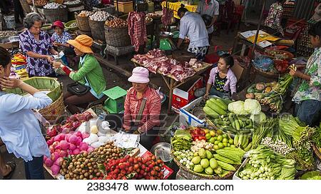 Shoppers and vendors at the Phnom Penh market; Phnom Penh, Cambodia View Large Photo Image Stock Photo - Shoppers and vendors at the Phnom Penh market; Phnom Penh, Cambodia. Fotosearch