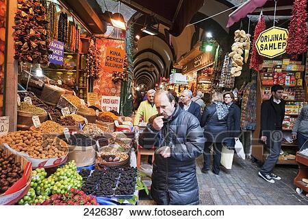 Shoppers in a market; Istanbul, Turkey View Large Photo Image Stock Photo - Shoppers in a market; Istanbul, Turkey. Fotosearch