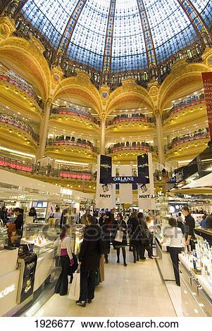 Shoppers Under The Domed Central Area Of Galeries Lafayette, Paris, France View Large Photo Image Stock Photo - Shoppers Under The Domed Central Area Of Galeries Lafayette, Paris, France. Fotosearch