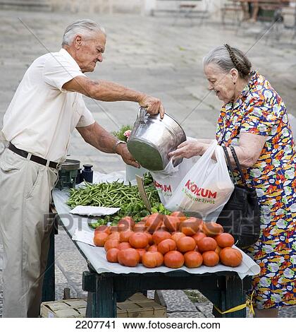 Shopping at the market; Dubrovnik, Croatia View Large Photo Image Stock Image - Shopping at the market; Dubrovnik, Croatia. Fotosearch