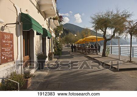 Shops Along The Promenade On The Coast; Monterosso Al Mare, Liguria, Italy View Large Photo Image Stock Image - Shops Along The Promenade On The Coast; Monterosso Al Mare, Liguria, Italy. Fotosearch
