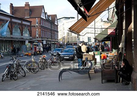 Stock Photograph - Shops Outside Spitalfields Market In East London, London, Uk. Fotosearch