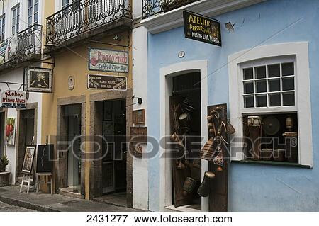 Shops selling musical instruments, crafts, coffee and cigars in the Pelourinho district; Salvador, Bahia, Brazil View Large Photo Image Stock Photo - Shops selling musical instruments, crafts, coffee and cigars in the Pelourinho district; Salvador, Bahia, Brazil. Fotosearch
