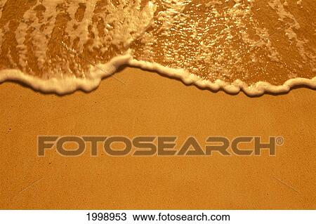 Shoreline Water Washes Onto Golden Sand At Sunset B1492 View Large Photo Image Stock Image - Shoreline Water Washes Onto Golden Sand At Sunset B1492. Fotosearch
