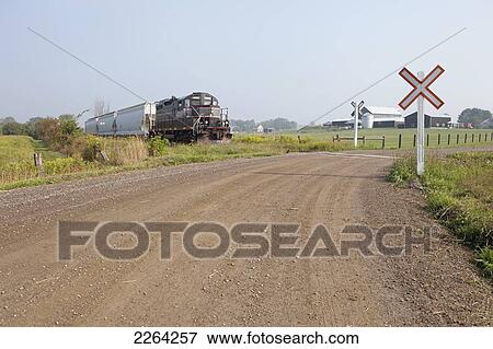 Shortline freight train at crossing; cheltenham ontario canada View Large Photo Image Stock Photo - Shortline freight train at crossing; cheltenham ontario canada. Fotosearch