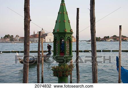 Stock Image - Shrine To St. Peter By The Bacino Di San Marco, Venice, Italy. Fotosearch