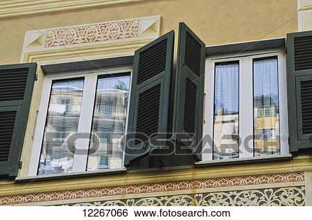 Shutters open on a building's windows; Manarola, Liguria, Italy View Large Photo Image Stock Photograph - Shutters open on a building's windows; Manarola, Liguria, Italy. Fotosearch