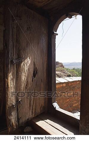 Side door into Abreha wa Atsbeha rock cut church; Gheralta, Tigray region, Ethiopia View Large Photo Image Stock Image - Side door into Abreha wa Atsbeha rock cut church; Gheralta, Tigray region, Ethiopia. Fotosearch