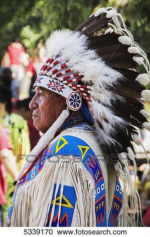 Side portrait of a Native American tribal chief; Calgary, Alberta, Canada View Large Photo Image Stock Image - Side portrait of a Native American tribal chief; Calgary, Alberta, Canada. Fotosearch