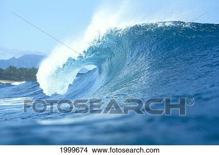Side View Of Large Wave With Curl Breaks Toward Shoreline Spray Off Tips C1756 View Large Photo Image Picture - Side View Of Large Wave With Curl Breaks Toward Shoreline Spray Off Tips C1756. Fotosearch