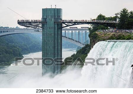 Stock Image - Sightseeing at Niagara Falls; Niagara Falls, New York, United States of America. Fotosearch