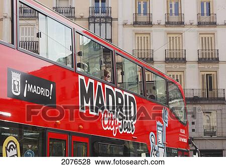 Sightseeing Bus In The Centre Of The City; Madrid Spain View Large Photo Image Stock Photo - Sightseeing Bus In The Centre Of The City; Madrid Spain. Fotosearch