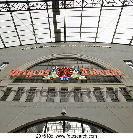 Stock Photography - Sign And Clock At The Railway Station; Bergen Norway. Fotosearch