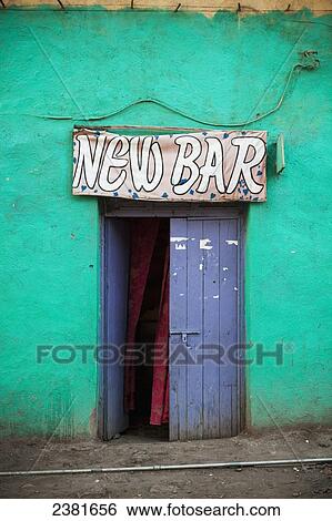 Stock Photograph - Sign and entrance to a bar; Ethiopia. Fotosearch