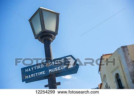 Sign for the Maritime Museum on a lamp post; Chania, Crete, Greece View Large Photo Image Stock Photo - Sign for the Maritime Museum on a lamp post; Chania, Crete, Greece. Fotosearch
