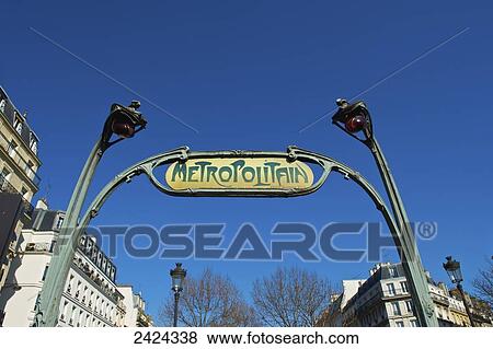 Stock Photo - Sign for the Metropolitain, the public rail transit; Paris, France. Fotosearch