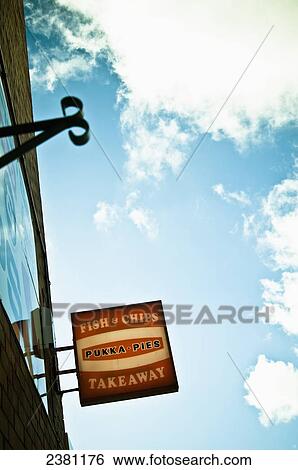 Stock Photograph - Sign outside a chip shop in the resort of Skegness; Lincolnshire, England. Fotosearch