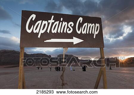 Stock Image - Sign Post Directions To The Captains Main Desert Camp, A Large Bedouin Tourist Camp, Wadi Rum, Jordan, Middle East. Fotosearch