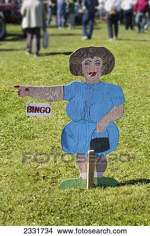 Sign Shaped Like A Woman Pointing To Bingo; British Columbia, Canada View Large Photo Image Picture - Sign Shaped Like A Woman Pointing To Bingo; British Columbia, Canada. Fotosearch