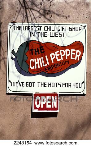 Sign ' The Largest Chili Gift Shop In The West, We've Got The Hots For You' At The Chili Pepper Emporium, Albuquerque, New Mexico, Usa. View Large Photo Image Picture - Sign ' The Largest Chili Gift Shop In The West, We've Got The Hots For You' At The Chili Pepper Emporium, Albuquerque, New Mexico, Usa.. Fotosearch