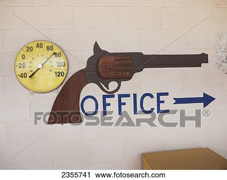 Sign Using An Image Of A Wild West Six-Shooter Pistol At An Rv Park To Locate The Office; Dodge City, Kansas, United States Of America View Large Photo Image Stock Image - Sign Using An Image Of A Wild West Six-Shooter Pistol At An Rv Park To Locate The Office; Dodge City, Kansas, United States Of America. Fotosearch