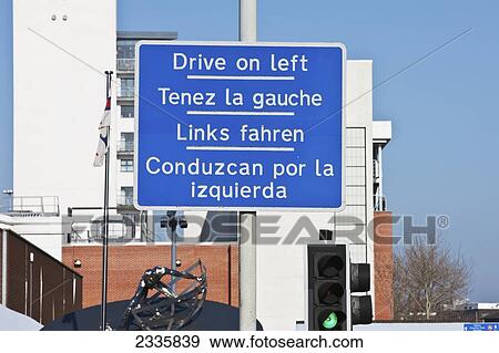 Signposts With Information In Several Languages; Poole, Dorset, England, United Kingdom View Large Photo Image Stock Photo - Signposts With Information In Several Languages; Poole, Dorset, England, United Kingdom. Fotosearch