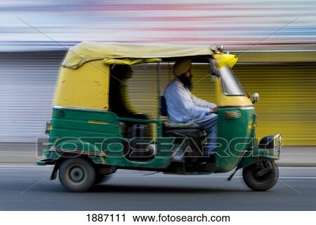 Sikh Driving Rickshaw Early In The Morning, Blurred Motion View Large Photo Image Stock Image - Sikh Driving Rickshaw Early In The Morning, Blurred Motion. Fotosearch