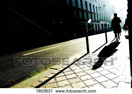 Silhouette And Shadow Of Person Walking On Sidewalk, Paris, France View Large Photo Image Stock Image - Silhouette And Shadow Of Person Walking On Sidewalk, Paris, France. Fotosearch