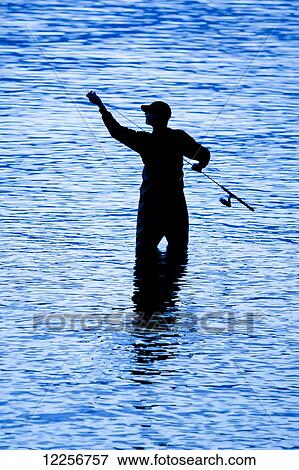 Silhouette of a man fishing in the river; Surrey, British Columbia, Canada View Large Photo Image Stock Photo - Silhouette of a man fishing in the river; Surrey, British Columbia, Canada. Fotosearch