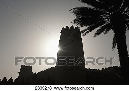 Silhouette Of Al Jahili Fort; Al Ain, Abu Dhabi, United Arab Emirates View Large Photo Image Stock Photo - Silhouette Of Al Jahili Fort; Al Ain, Abu Dhabi, United Arab Emirates. Fotosearch