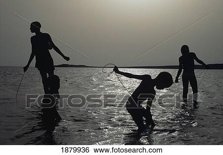 Silhouette Of Boys Fishing View Large Photo Image Stock Photograph - Silhouette Of Boys Fishing. Fotosearch
