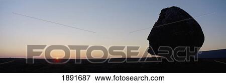 Silhouette Of Head-Shaped Boulder At Dusk View Large Photo Image Stock Photo - Silhouette Of Head-Shaped Boulder At Dusk. Fotosearch
