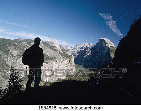 Silhouette Of Hiker Looking Towards Half Dome And The Yosemite Valley View Large Photo Image Stock Photography - Silhouette Of Hiker Looking Towards Half Dome And The Yosemite Valley. Fotosearch