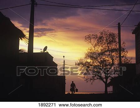 Silhouette Of Man And Houses At Dawn View Large Photo Image Stock Image - Silhouette Of Man And Houses At Dawn. Fotosearch