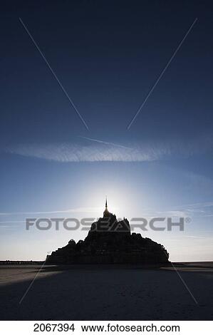 Picture - Silhouette Of Mont-Saint-Michel And Mudflats In The Bay, As Seen From The East, France. Fotosearch